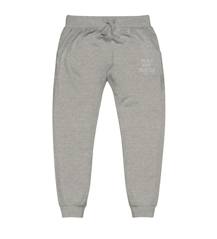 Blakk Apparel Built Off Hustle logo joggers white lettering, featuring a bold design and comfortable fit, empowering you to conquer your goals with confidence.