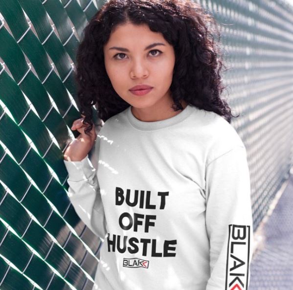 Blakk Apparel Built Off Hustle Unisex t-shirt featuring a bold design and comfortable fit, empowering you to conquer your goals with confidence.